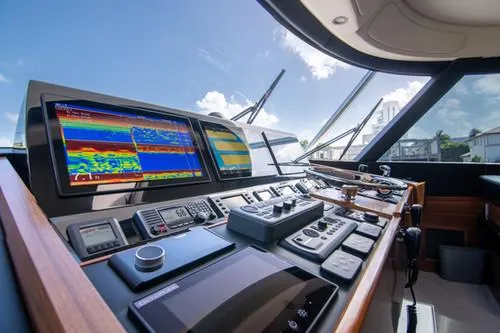 Caballo Grande Yacht Photos Pics 2024 Viking Convertible EB yacht cockpit with advanced navigation systems and controls.