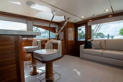 Caballo Grande Yacht Photos Pics Luxurious interior of 2024 Viking Convertible EB yacht with modern seating and elegant design.