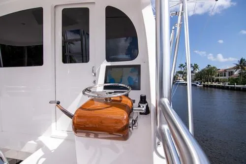 Caballo Grande Yacht Photos Pics 2024 Viking Convertible EB yacht helm with wooden controls and navigation screen.