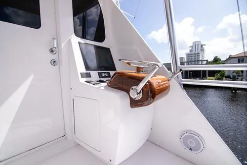 Caballo Grande Yacht Photos Pics 2024 Viking Convertible EB yacht helm with modern controls and waterfront view.