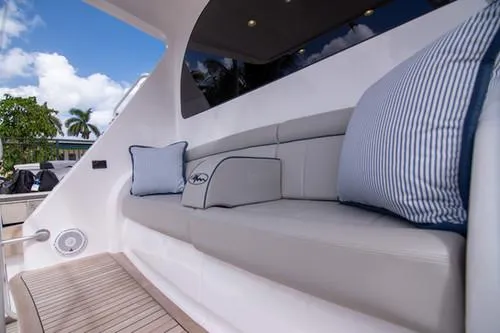 Caballo Grande Yacht Photos Pics Luxurious seating area on 2024 Viking Convertible EB yacht with plush cushions.
