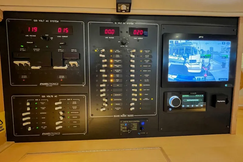  Yacht Photos Pics Electrical control panel of 2023 Island Packet 439 yacht with navigation display.