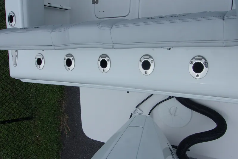  Yacht Photos Pics 2025 Bluewater 23 T boat interior with rod holders and seating.