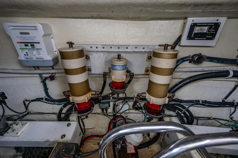 Kell Bell Yacht Photos Pics Engine room of 2001 Navigator Pilothouse with fuel filters and control panels.