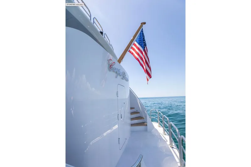 Carpe Diem Yacht Photos Pics Luxury yacht Intermarine RPH 95, 2001 model, with American flag, ocean view.