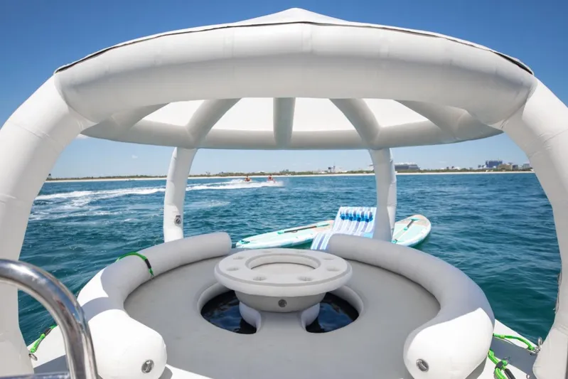 Carpe Diem Yacht Photos Pics Inflatable seating area on a 2001 Intermarine RPH 95 yacht, ocean view.