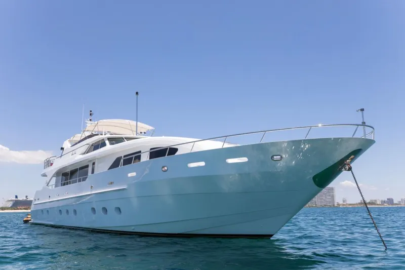 Carpe Diem Yacht Photos Pics Luxury yacht Intermarine RPH 95, 2001 model, anchored in clear blue waters.