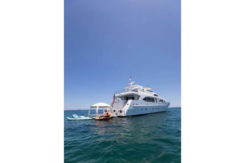 Carpe Diem Yacht Photos Pics Luxury yacht Intermarine RPH 95, 2001 model, anchored on calm blue sea.