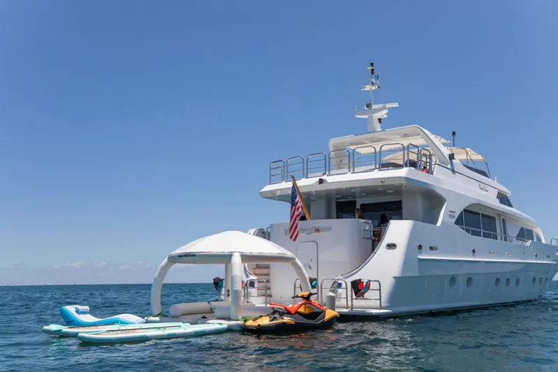 Carpe Diem Yacht Photos Pics Luxury yacht Intermarine RPH 95 (2001) with water sports equipment on a sunny day.