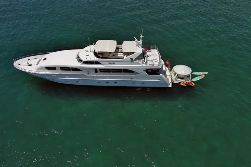 Carpe Diem Yacht Photos Pics Luxury 2001 Intermarine RPH 95 yacht on clear blue ocean waters.