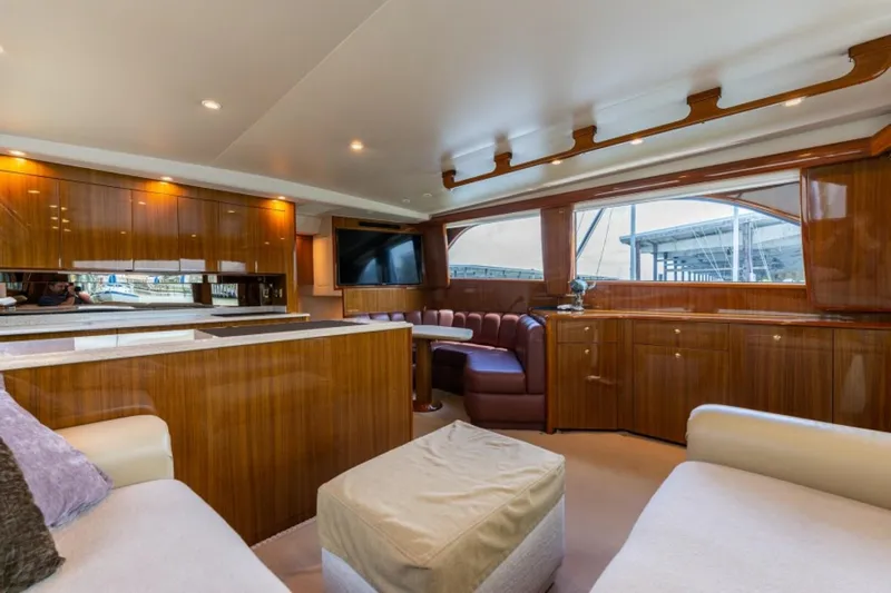 Kraken Yacht Photos Pics Luxurious interior of a 2007 Viking 52 Convertible yacht with elegant wood finishes.