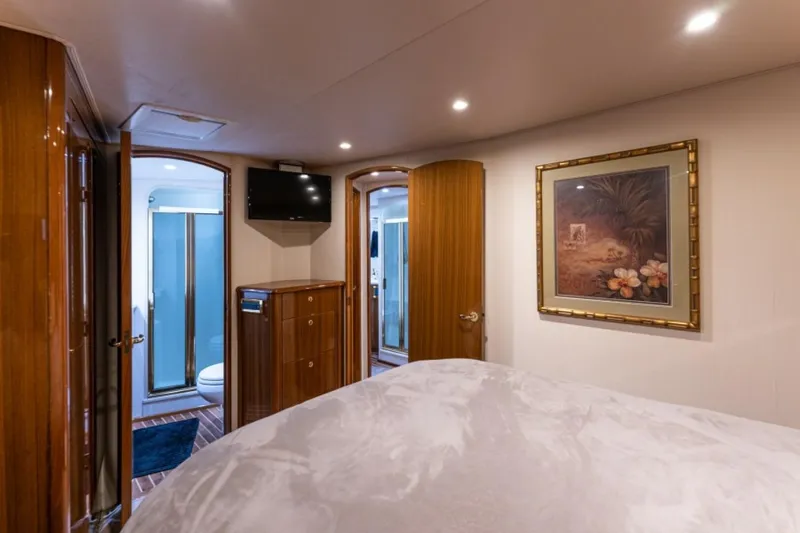 Kraken Yacht Photos Pics Luxurious interior of 2007 Viking 52 Convertible yacht with elegant wood finishes and modern amenities.