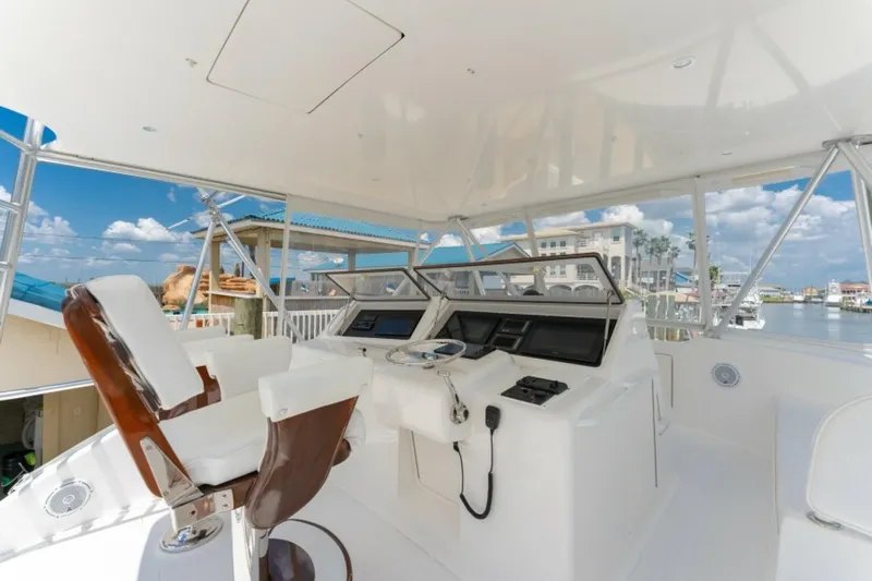 Kraken Yacht Photos Pics 2007 Viking 52 Convertible yacht helm with modern controls and ocean view.