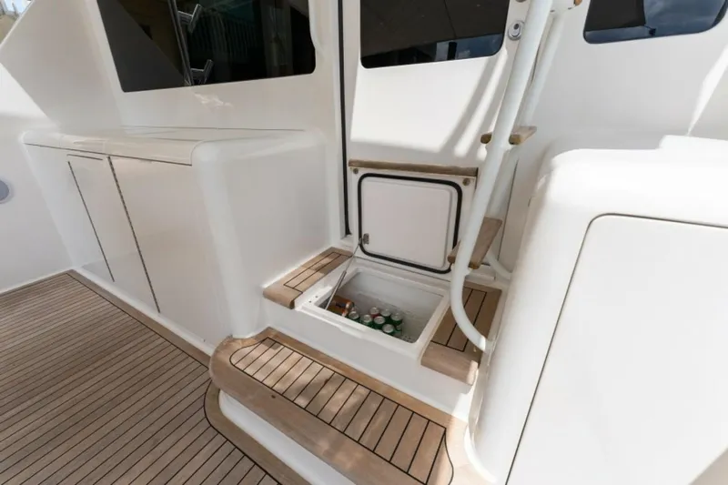 Kraken Yacht Photos Pics 2007 Viking 52 Convertible yacht deck with storage and steps.