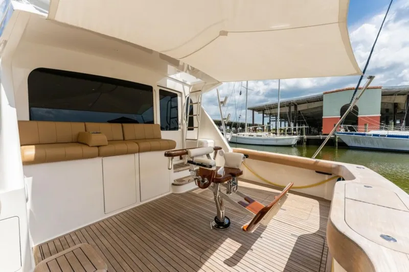 Kraken Yacht Photos Pics 2007 Viking 52 Convertible yacht deck with seating and fishing chair.