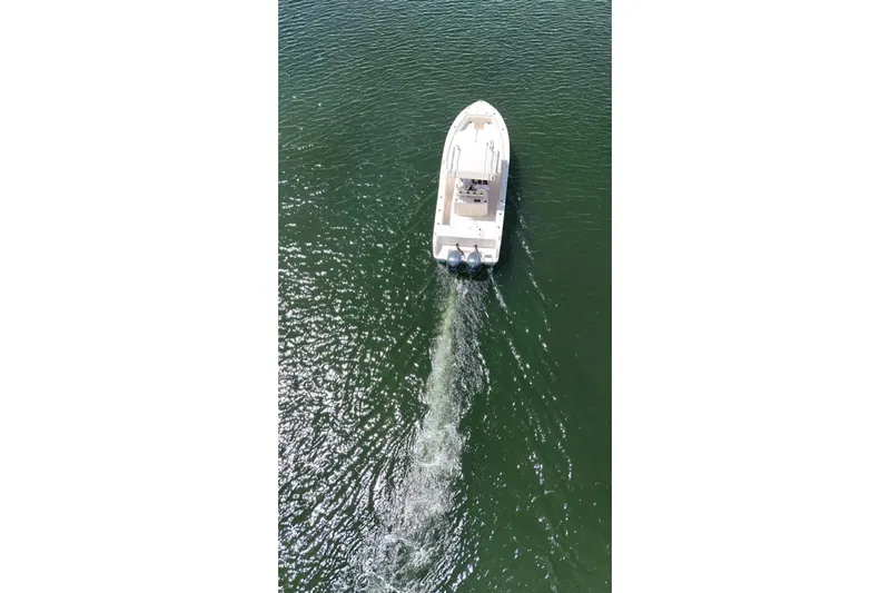  Yacht Photos Pics Aerial view of 2019 Grady-White Canyon 306 boat cruising on water.