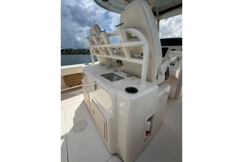  Yacht Photos Pics 2019 Grady-White Canyon 306 boat interior with seating and storage compartments.