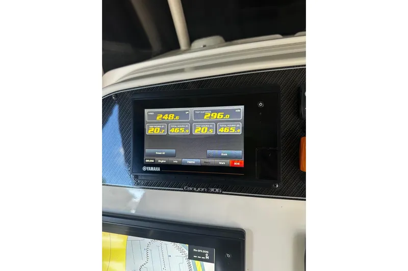  Yacht Photos Pics Dashboard of 2019 Grady-White Canyon 306 boat with Yamaha display showing trip data.