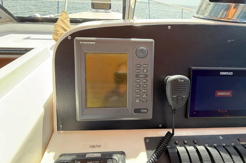 St. Elmo's Fire II Yacht Photos Pics Boat dashboard with Furuno and Simrad navigation systems, Legacy 40, 1999 model.