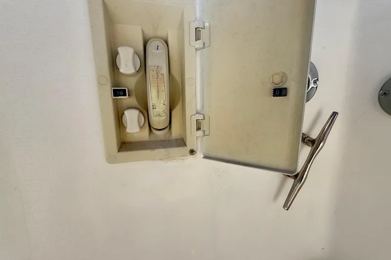 St. Elmo's Fire II Yacht Photos Pics Electrical panel with switches and handle on a Legacy 40, 1999 model.