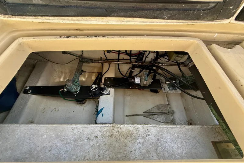 St. Elmo's Fire II Yacht Photos Pics Engine compartment of a 1999 Legacy 40 boat, showing mechanical components and wiring.