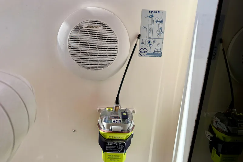 St. Elmo's Fire II Yacht Photos Pics Bose speaker and EPIRB device on 1999 Legacy 40 boat interior.