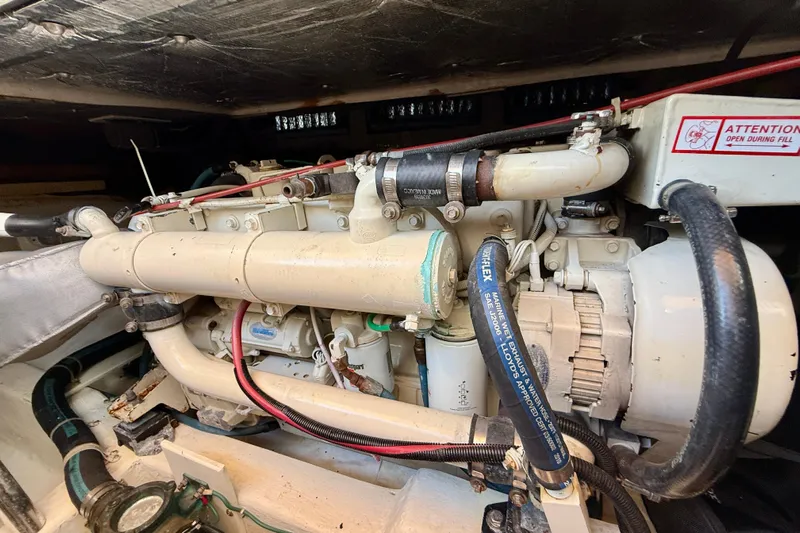 St. Elmo's Fire II Yacht Photos Pics Engine compartment of a 1999 Legacy 40 boat, showcasing detailed mechanical components.