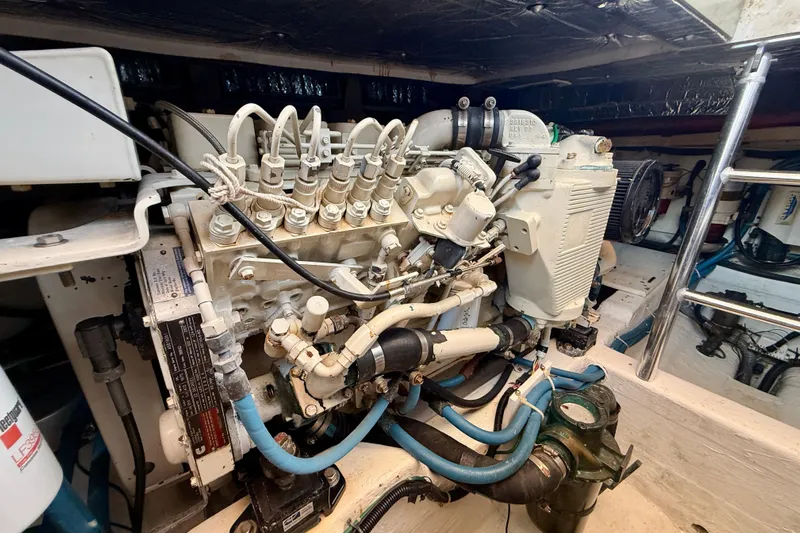 St. Elmo's Fire II Yacht Photos Pics Engine room of a 1999 Legacy 40 boat, showcasing detailed mechanical components.