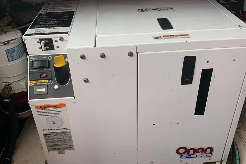 Tranquility Yacht Photos Pics Onan generator in a 2008 Back Cove 33 Hard Top Express boat engine room.