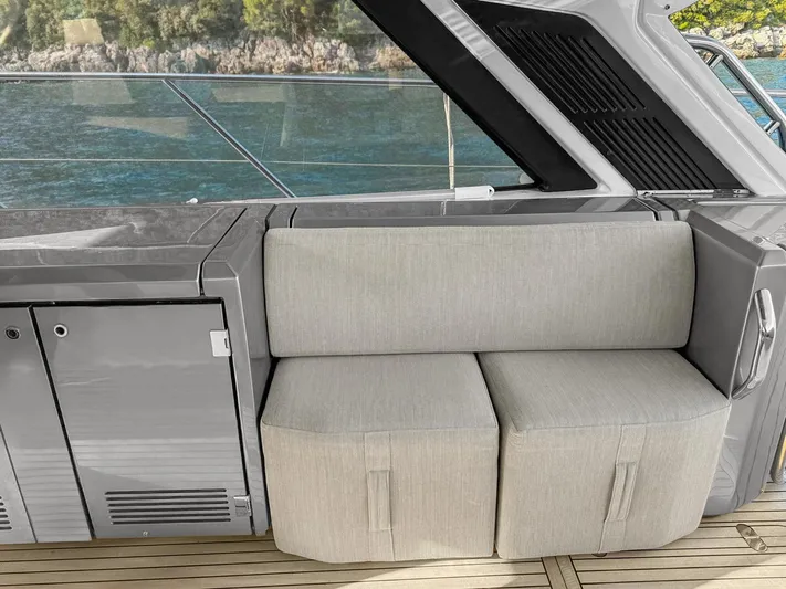  Yacht Photos Pics Azimut Atlantis 51 yacht interior, 2022 model, featuring sleek seating and modern design.