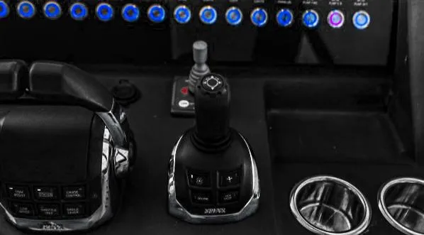  Yacht Photos Pics Control panel of 2022 Azimut Atlantis 51 yacht with joystick and buttons.
