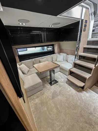  Yacht Photos Pics Luxurious interior of 2022 Azimut Atlantis 51 yacht with elegant seating and modern design.