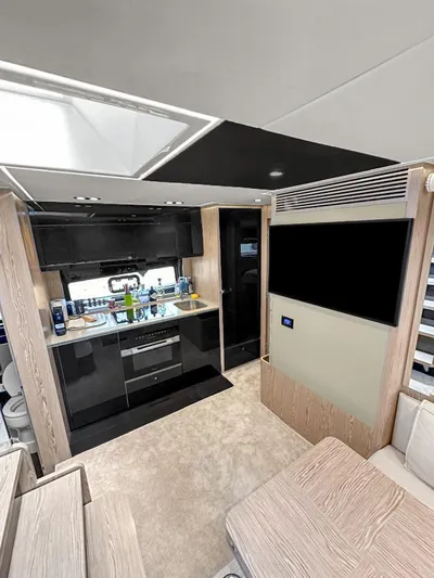  Yacht Photos Pics Interior of 2022 Azimut Atlantis 51 yacht, featuring modern kitchen and sleek design.