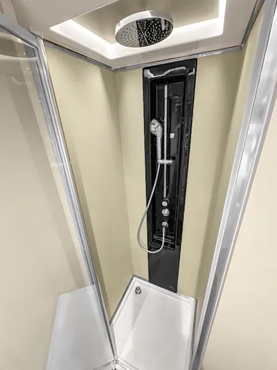  Yacht Photos Pics Luxury shower in 2022 Azimut Atlantis 51 yacht, featuring modern fixtures and sleek design.