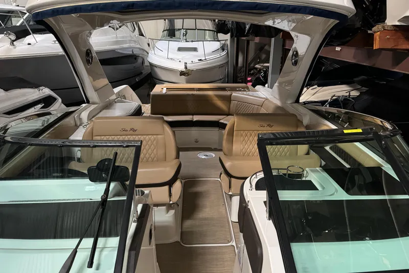  Yacht Photos Pics 2020 Sea Ray SLX 310 boat interior with tan seating and modern design.