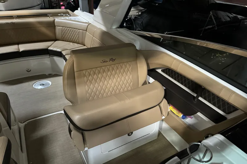  Yacht Photos Pics Luxurious interior of 2020 Sea Ray SLX 310 boat with tan leather seating.
