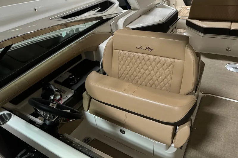  Yacht Photos Pics Luxurious interior of 2020 Sea Ray SLX 310 boat with tan leather seating.