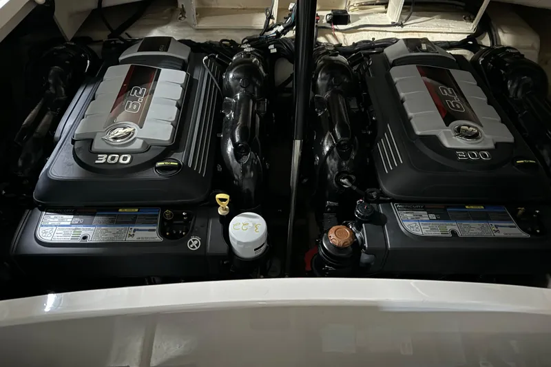 Yacht Photos Pics Twin engines of a 2020 Sea Ray SLX 310 boat, showcasing 6.2L 300 horsepower.