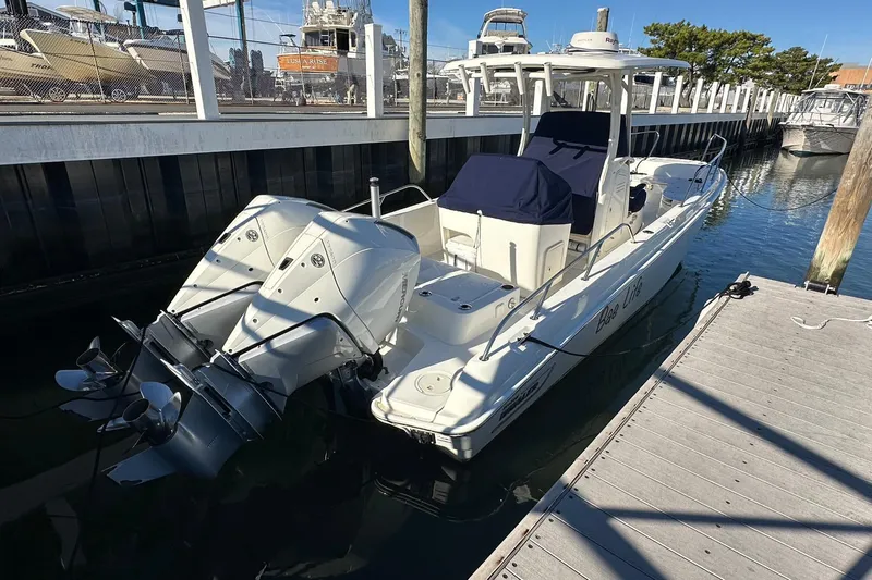 Bae Life Yacht Photos Pics 2022 Boston Whaler 270 Dauntless boat docked with dual engines.