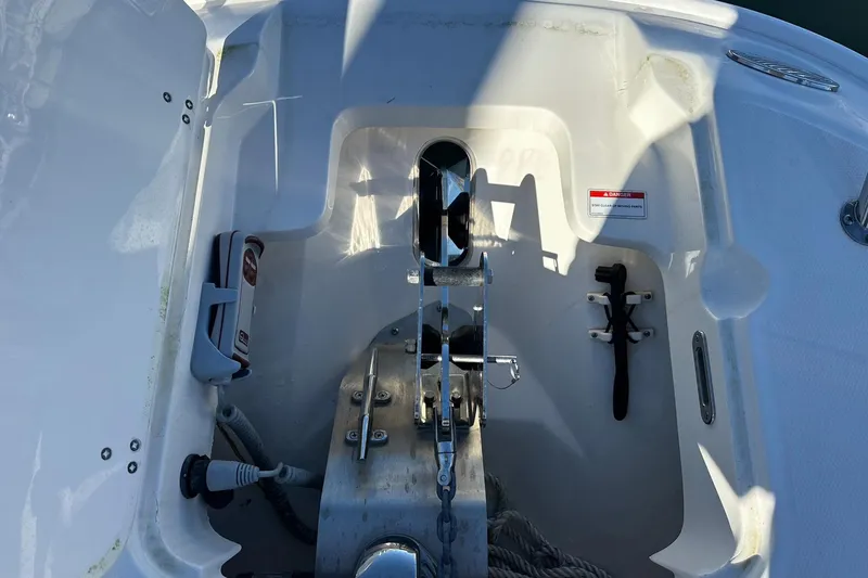 Bae Life Yacht Photos Pics Anchor compartment of 2022 Boston Whaler 270 Dauntless boat, featuring anchor and rope storage.