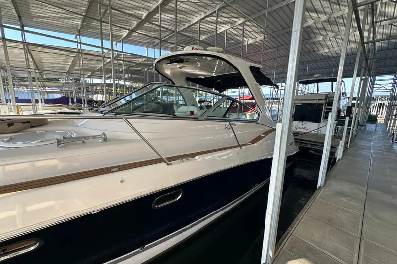  Yacht Photos Pics 2006 Four Winns 378 Vista yacht docked in a covered marina.