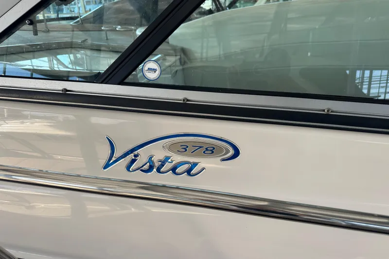  Yacht Photos Pics 2006 Four Winns 378 Vista boat logo on side panel.