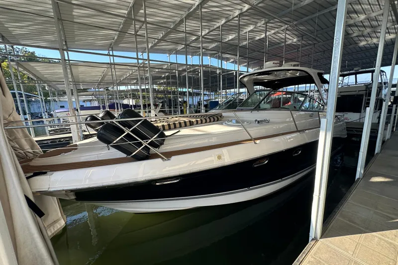  Yacht Photos Pics 2006 Four Winns 378 Vista yacht docked in a covered marina.