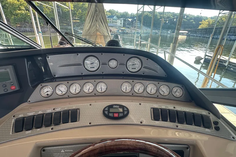 Yacht Photos Pics Dashboard of a 2006 Four Winns 378 Vista boat with gauges and controls.