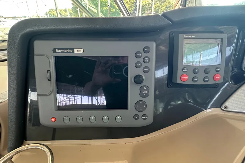  Yacht Photos Pics 2006 Four Winns 378 Vista boat dashboard with Raymarine navigation systems.