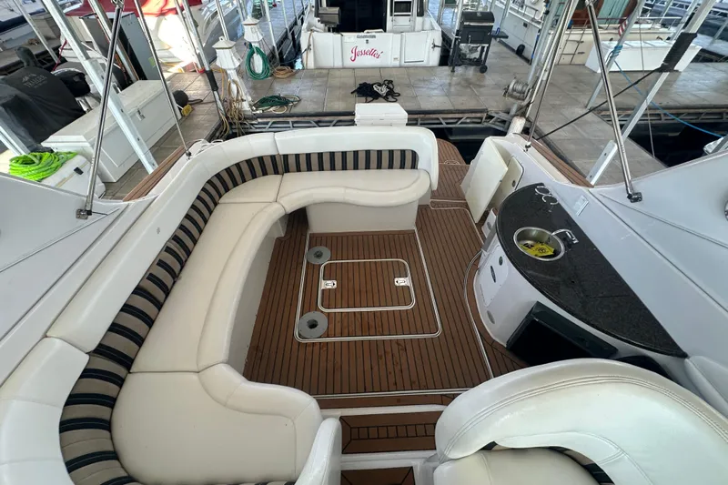  Yacht Photos Pics 2006 Four Winns 378 Vista yacht interior with seating and kitchenette on deck.