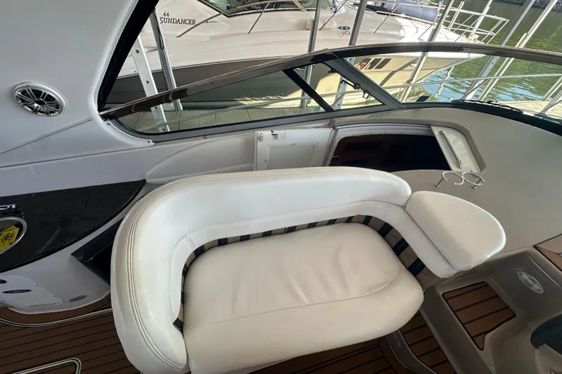  Yacht Photos Pics 2006 Four Winns 378 Vista boat interior with white seating and wooden deck.