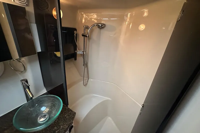  Yacht Photos Pics Luxurious bathroom in 2006 Four Winns 378 Vista yacht with modern fixtures.