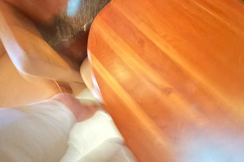  Yacht Photos Pics Blurry interior view of 2006 Four Winns 378 Vista boat with wooden surfaces.