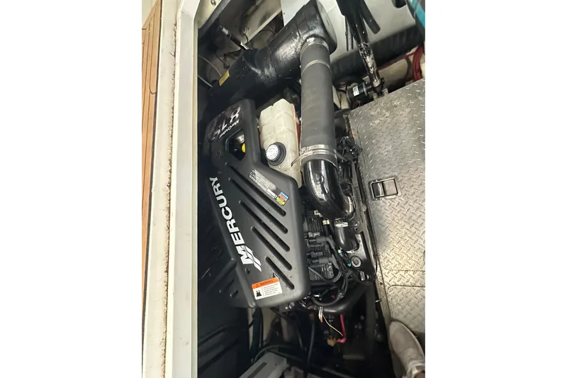  Yacht Photos Pics Engine compartment of 2006 Four Winns 378 Vista with Mercury engine components.